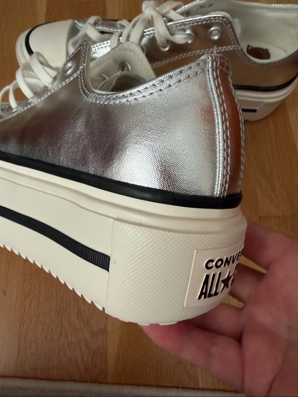 Converse Women’s Platform Sneakers - Metallic Silver with White Sole.